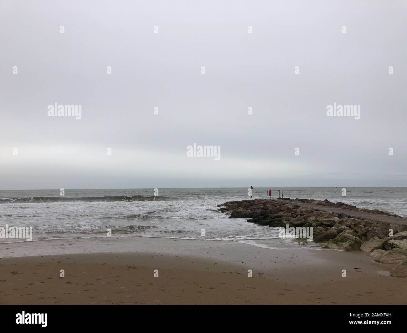 The blue flaged beach of Sandbanks, showing how the sea and rain during