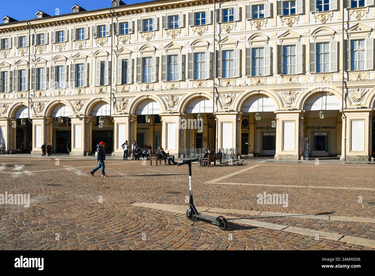 Electric scooter for sharing parked in San Carlo Square in the historic centre of Turin in front of Renaud di Faliçon Palace, Piedmont, Italy Stock Photo