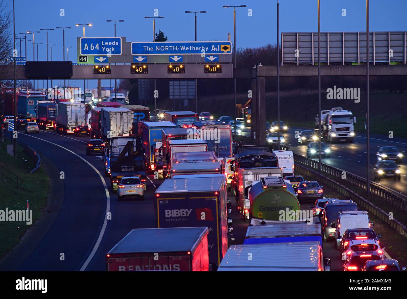 traffic jam on the A1/M motorway at twilight Bramham crossroads Leeds United Kingdom Stock Photo