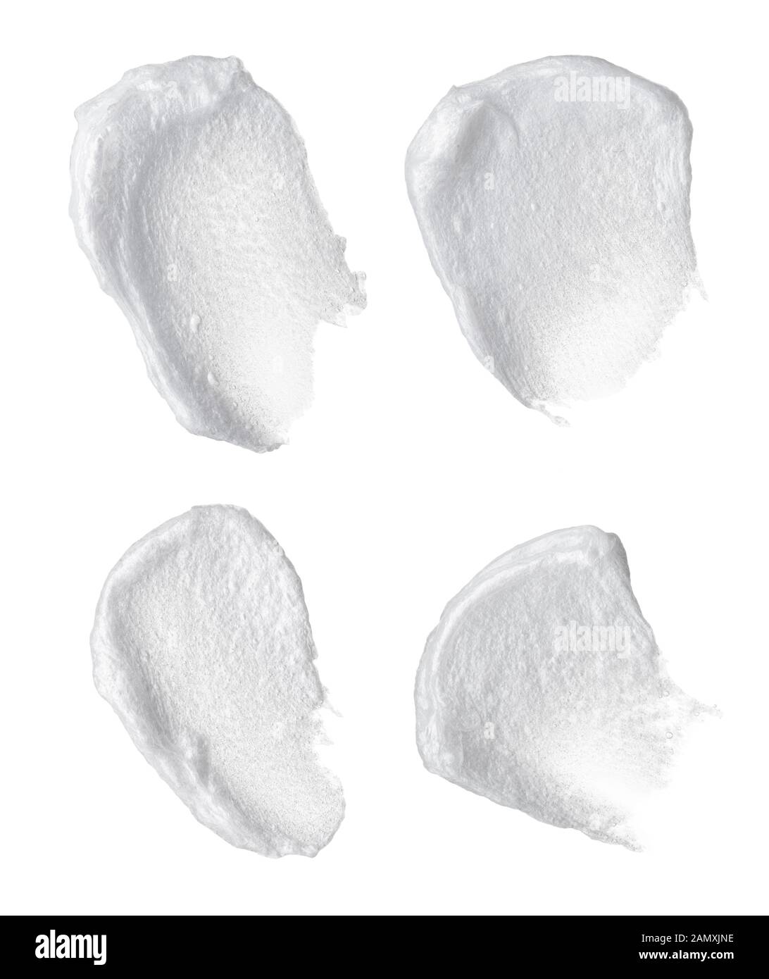 White smear of cosmetic cream or white acrylic paint isolated on white ...