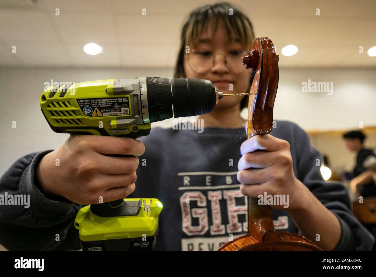 Chicago, USA. 14th Jan, 2020. A student uses a power drill to finish