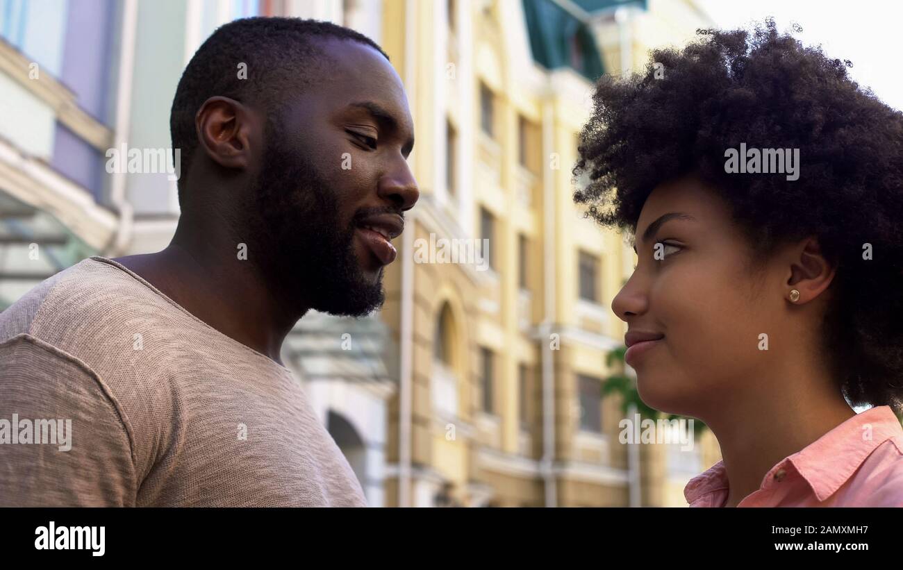 Man looking woman after street hi-res stock photography and images - Alamy