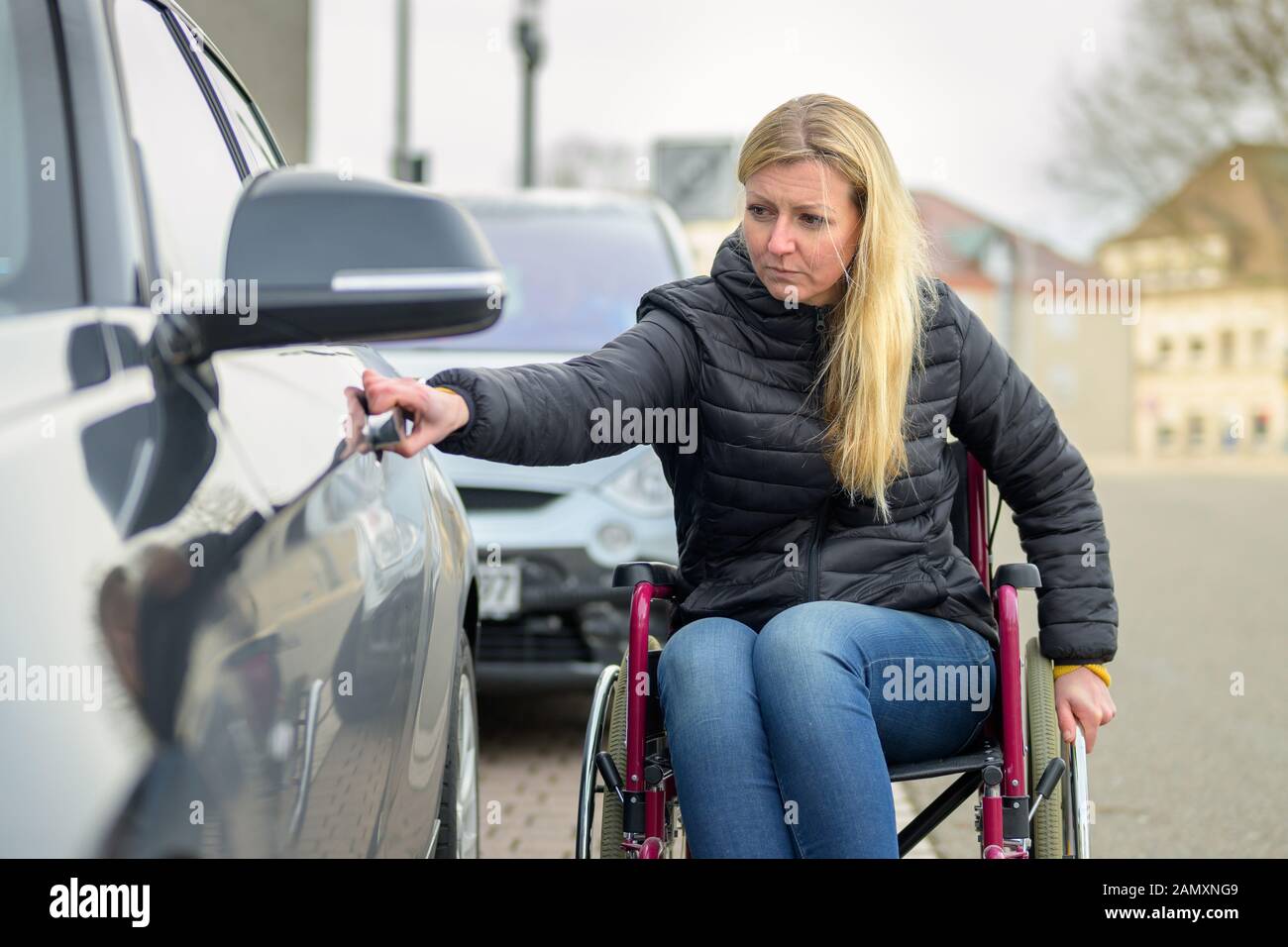 Disabled woman in a wheelchair hi-res stock photography and images - Alamy