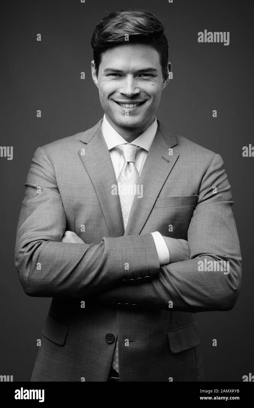 Studio businessman portrait arms Black and White Stock Photos & Images ...