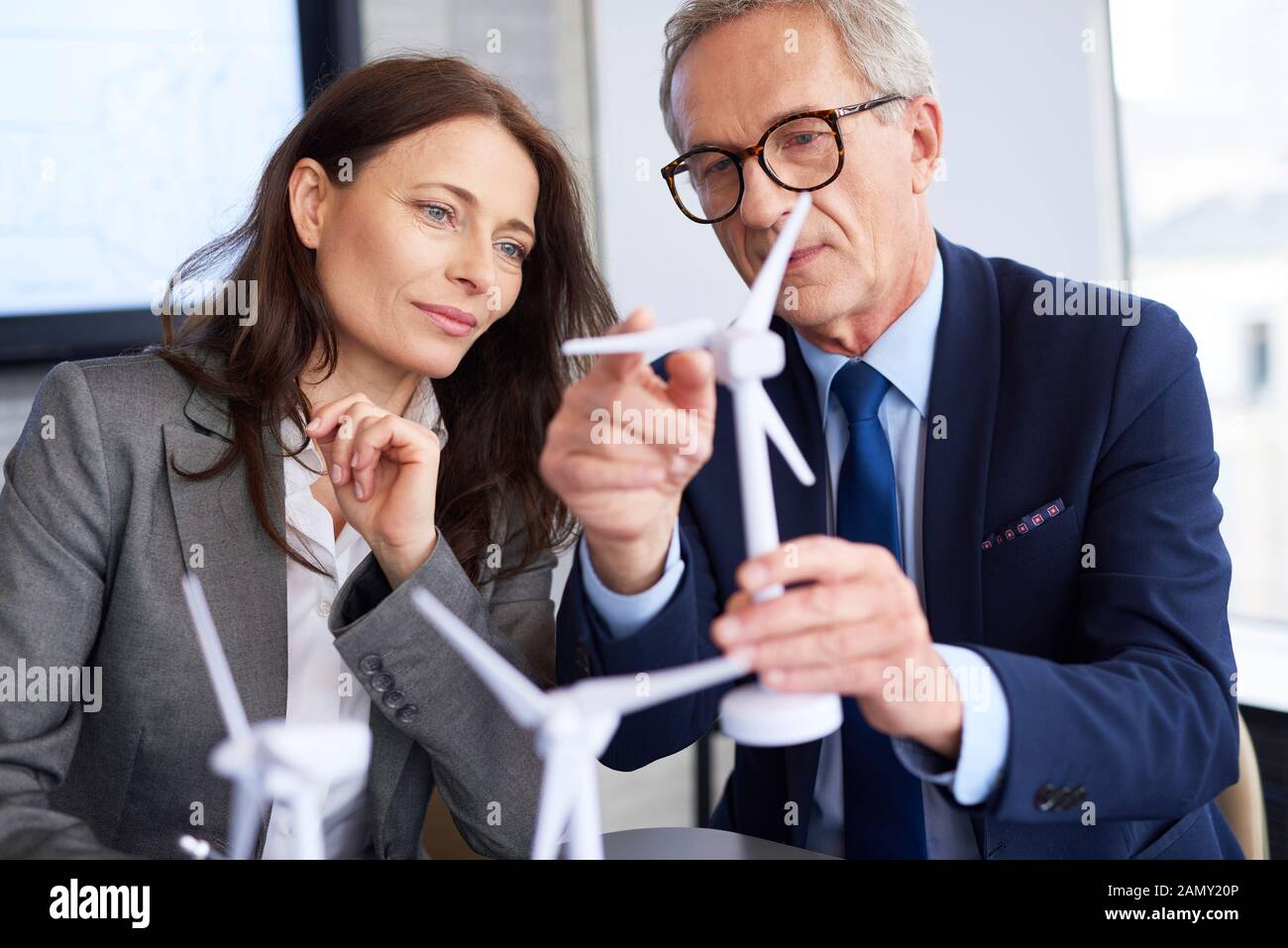 Business couple having serious conversation Stock Photo
