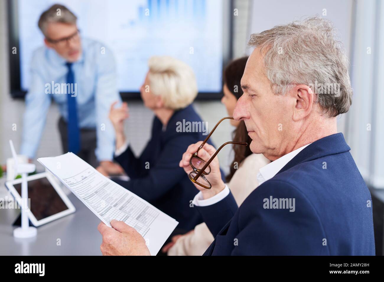Business person reading important documents Stock Photo