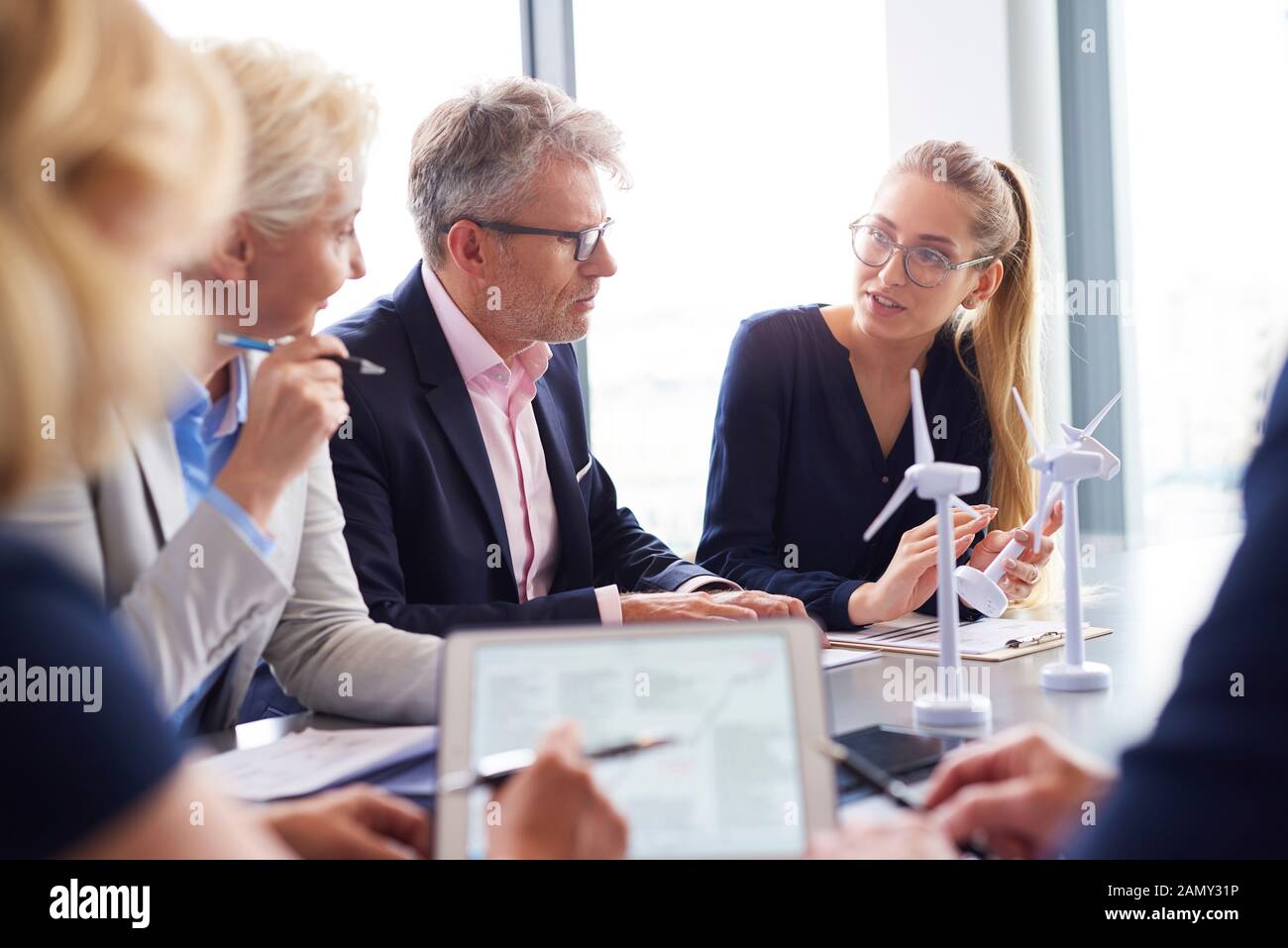 Business people having serious conversation in the conference room Stock Photo