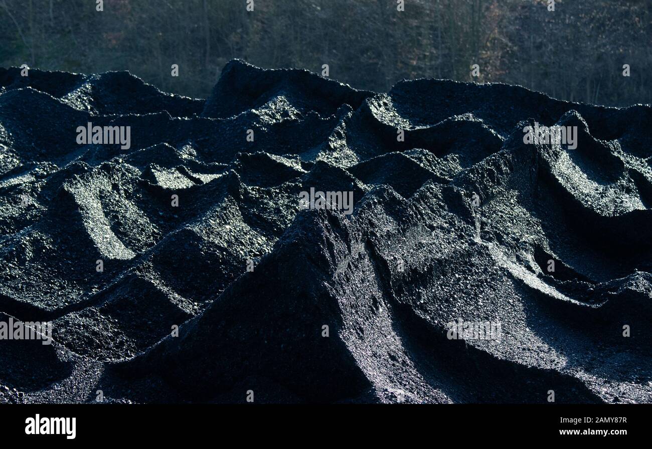 Hohenhameln, Germany. 15th Jan, 2020. Hard coal is stored in the coal port of the Mehrum coal-fired power plant in the district of Peine. In the evening, a top-level meeting on the coal exit takes place in the Chancellery. This involves a precise timetable for ending climate-damaging coal-based electricity generation. Germany wants to gradually phase out the climate-damaging combustion of coal for electricity generation by 2038. Credit: Julian Stratenschulte/dpa/Alamy Live News Stock Photo