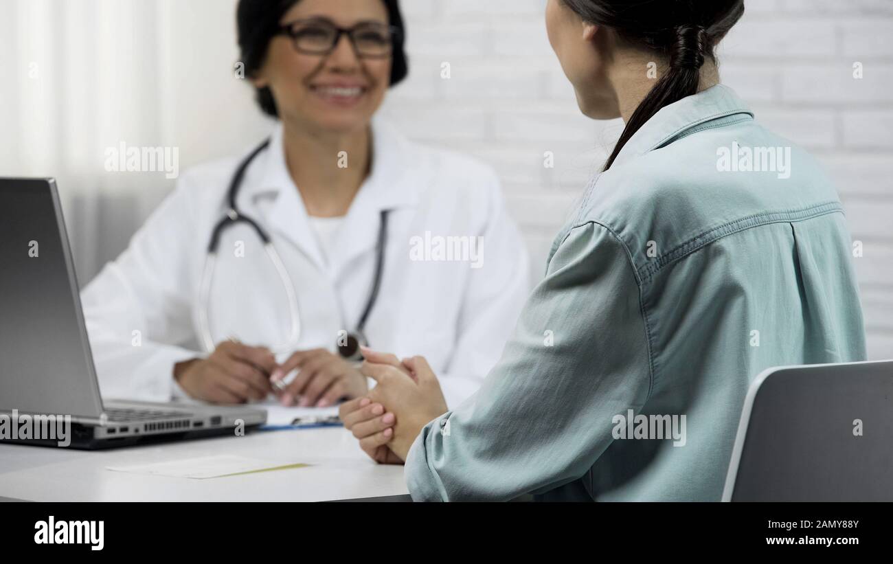 Asian doctor patient happiness hi-res stock photography and images - Alamy