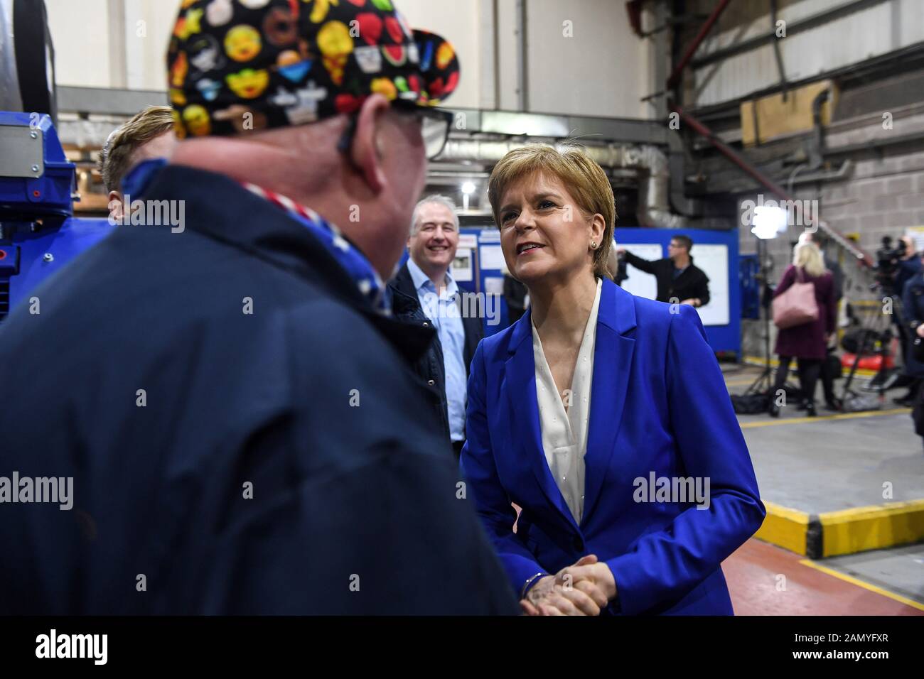 Scotland's First Minister, Nicola Sturgeon, meets employees, during a