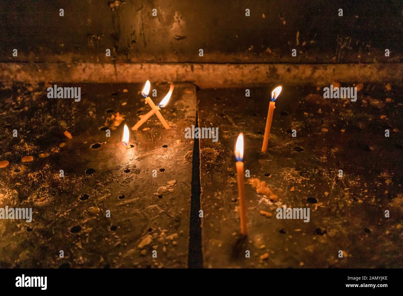 Lighting candles in a orthodox church. Close up Stock Photo Alamy
