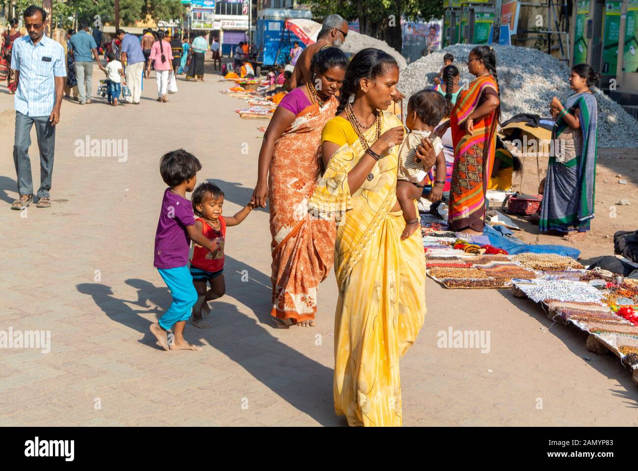 A local female holding a baby, Madurai, South India Stock Photo