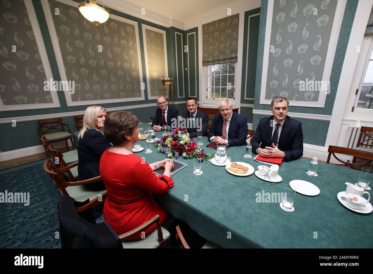 BELFAST, Jan. 13, 2020 Tánaiste Simon Coveney, Taoiseach (Irish prime minister) Leo Varadka,  British Prime Minister Boris Johnson and  meets  Northern Ireland Secretary of State Julian Smith hold the first meeting with the  Deputy First Minister Michelle O'Neill and First Minister Arlene Foster  at Parliament Buildings at Stormont, Belfast, Northern Ireland on Jan 13, 2020. Stock Photo