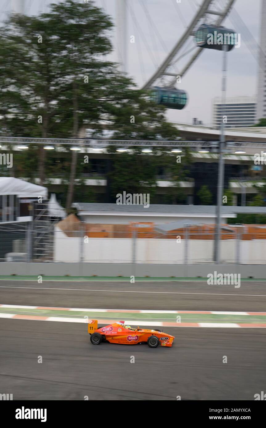 Formula 2 Racing Cars With Singapore Flyer In Background Singapore Grand Prix Central Business District Singapore Stock Photo Alamy