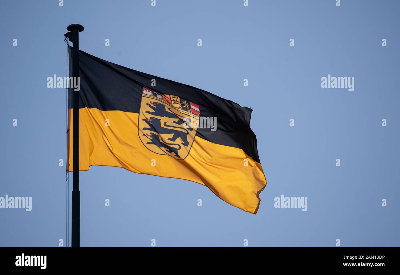 Stuttgart, Germany. 15th Jan, 2020. A flag of the state of Baden-Württemberg is waving in the wind against a blue sky. Credit: Marijan Murat/dpa/Alamy Live News Stock Photo