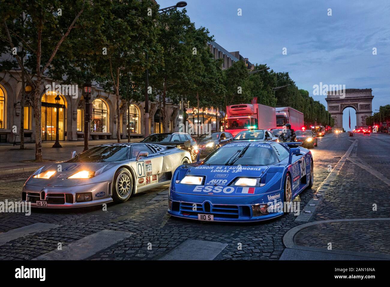 Bugatti EB110 Race cars on the Champs Elyse Paris Blue Car. 1994 LM Le Mans car. Silver Car 1995 GTS1 IMSA race car Stock Photo