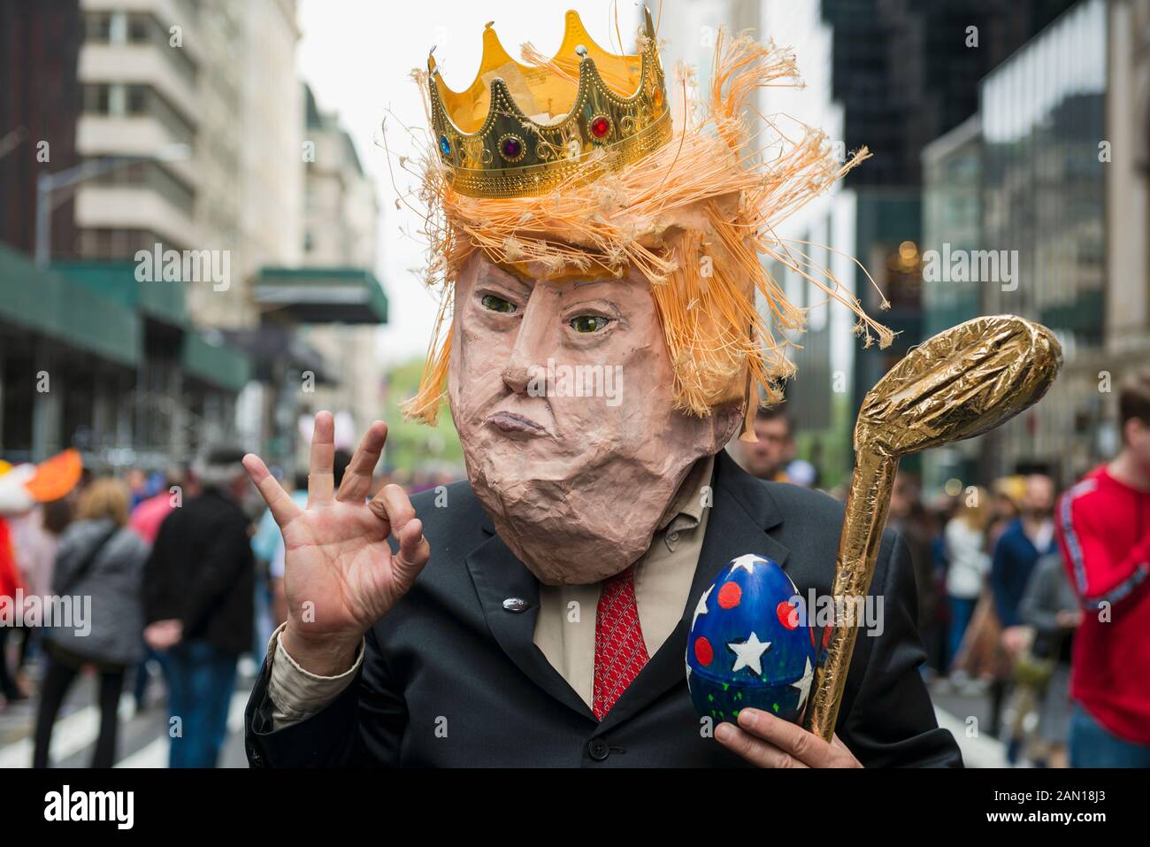 A person wearing a Donald Trump mask during New York’s Easter parade in 2019. Stock Photo