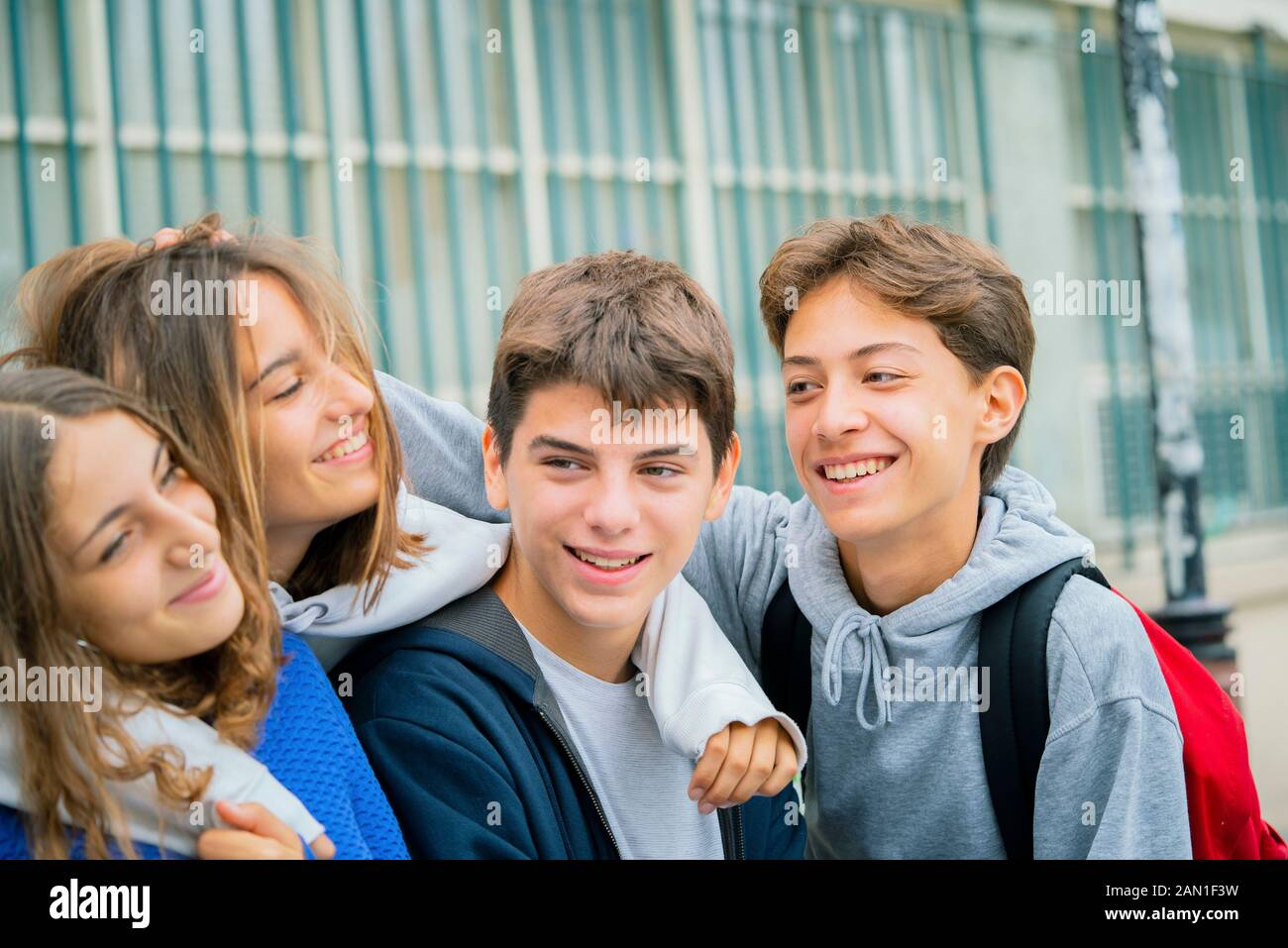 Friends sitting outdoors Stock Photo