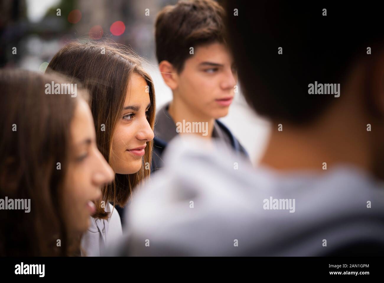 Friends standing outdoors Stock Photo