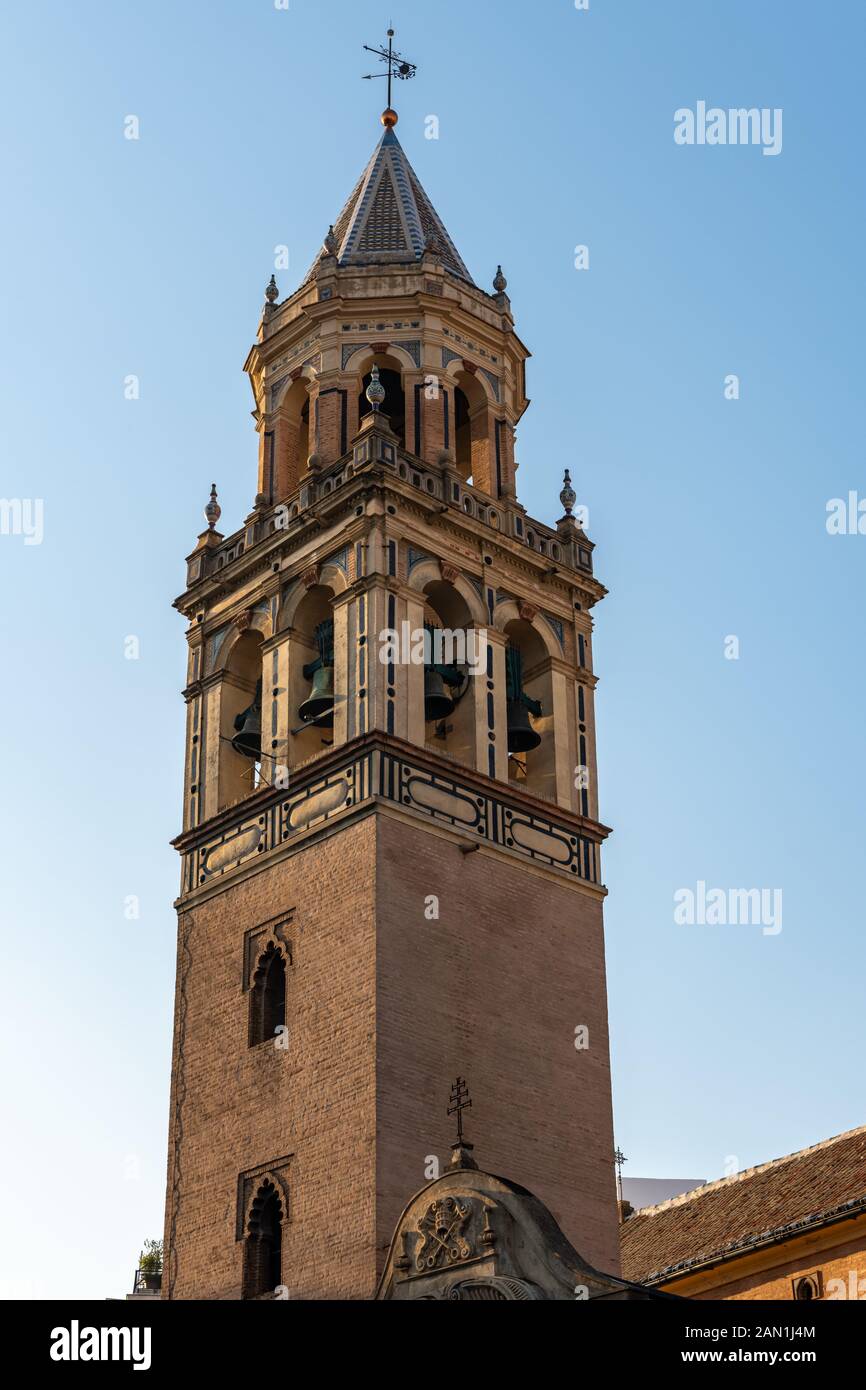 The bell tower of Iglesia de San Pedro, like the rest of the church, is a mix of Baroque and Mudejar styles. Velazquez was baptised in the church Stock Photo