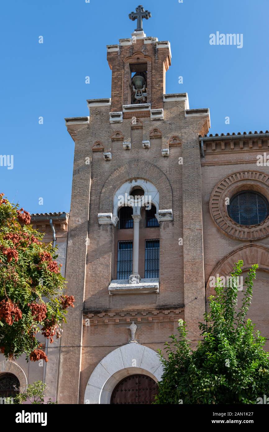 The tower and belfry of the Monasterio de la Visitacion de Santa Maria (Salesas Sevilla) in Plaza de las Mercedarias, Seville. Stock Photo