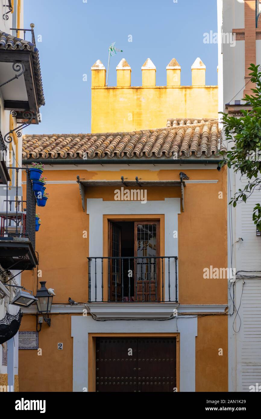 Strikingly colourful buildings in Calle Vida in Seville's old Jewish Quarter Stock Photo