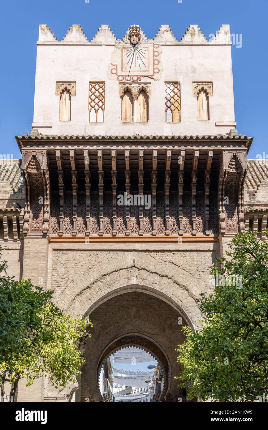 The ornate Puerta del Perdón (Door of Forgiveness) from the Patio de los Naranjos (Orange Trees) in Seville Cathedral. Stock Photo