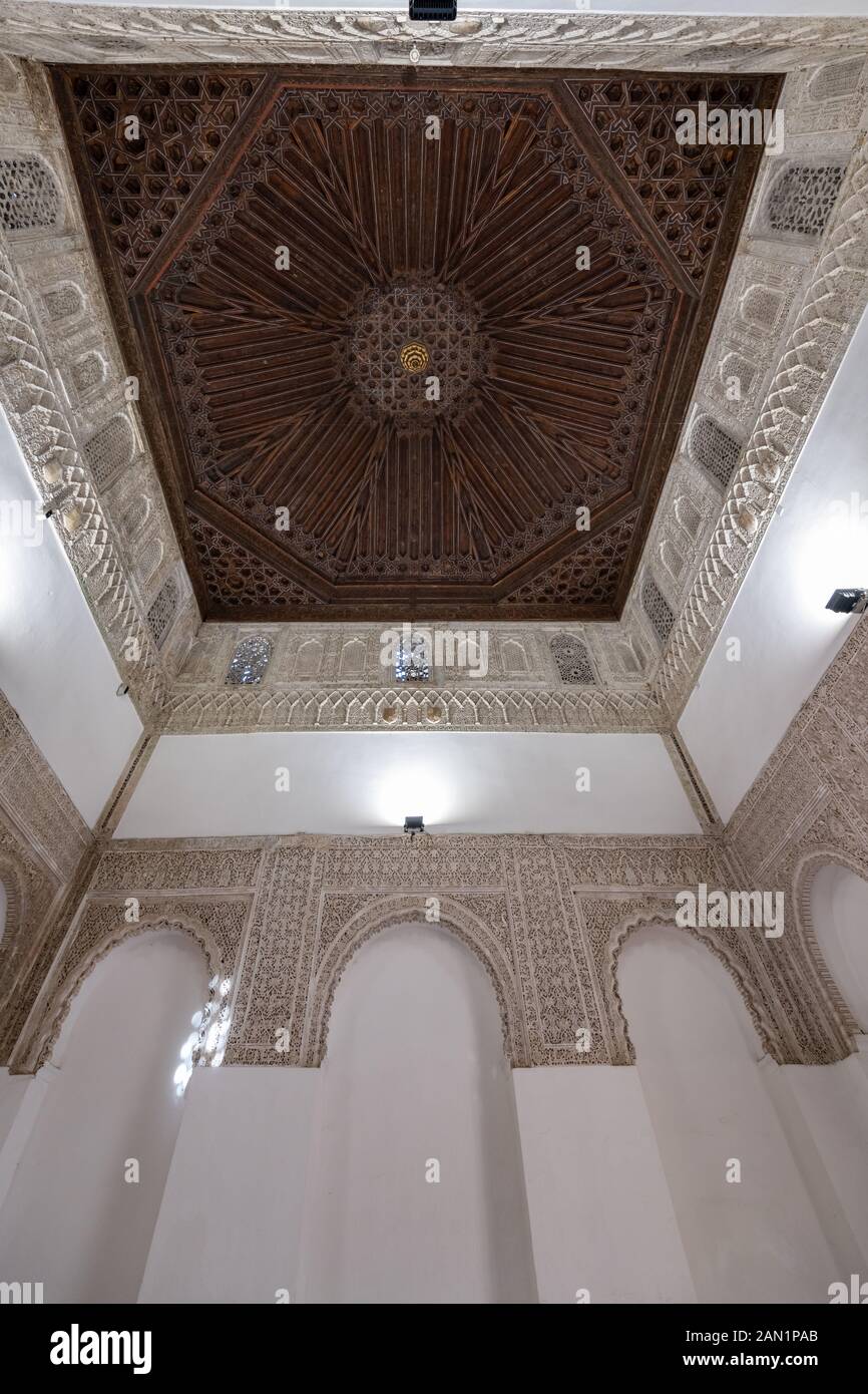 The octagonal coffered ceiling and ornate Muslim stuccowork of the Sala de Justica (Hall of Justice) or Sala del Consejo in the Real Alcázar Stock Photo