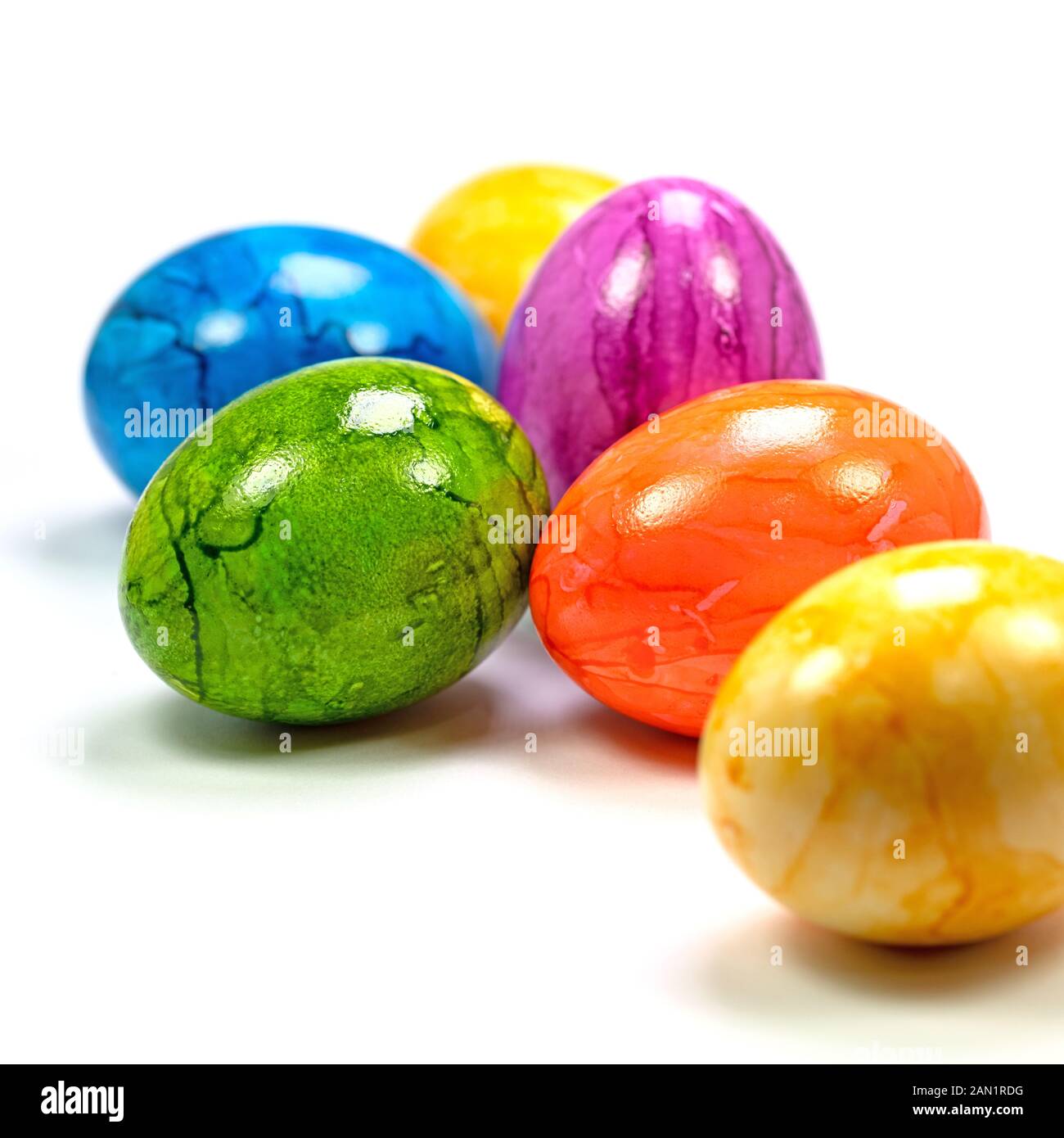 Colorful easter eggs against white background Stock Photo