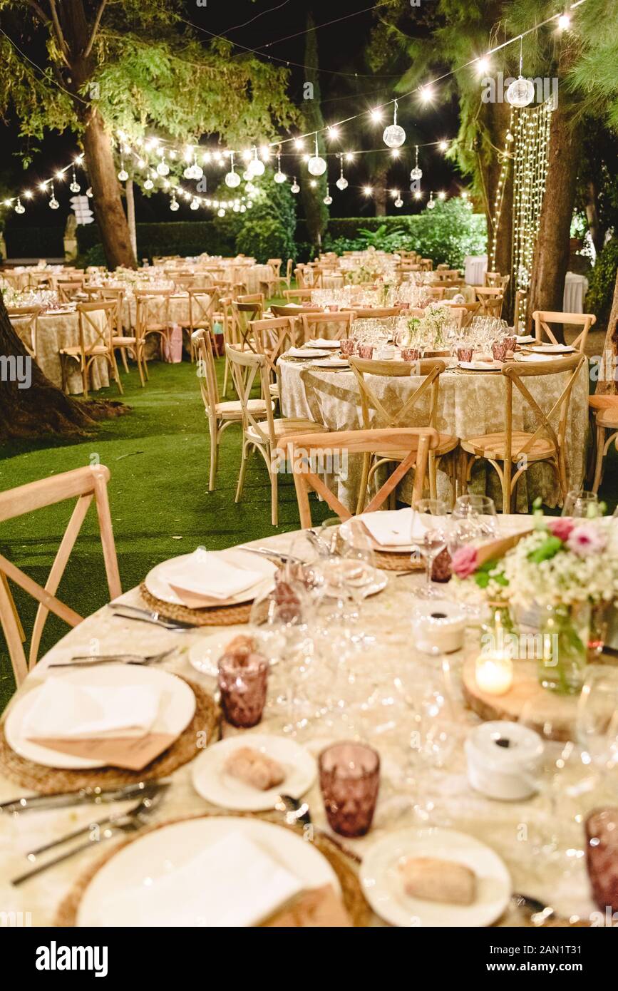 Outdoor Tables For An Elegantly Decorated Wedding Reception With