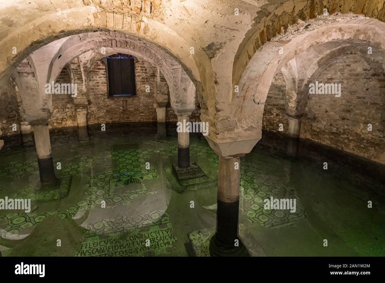 RAVENNA, ITALY - FEBRUARY 16, 2018: Crypt under water in Basilica of San Francesco at Ravenna, Italy. It is irst build in 450 and it is a major church Stock Photo