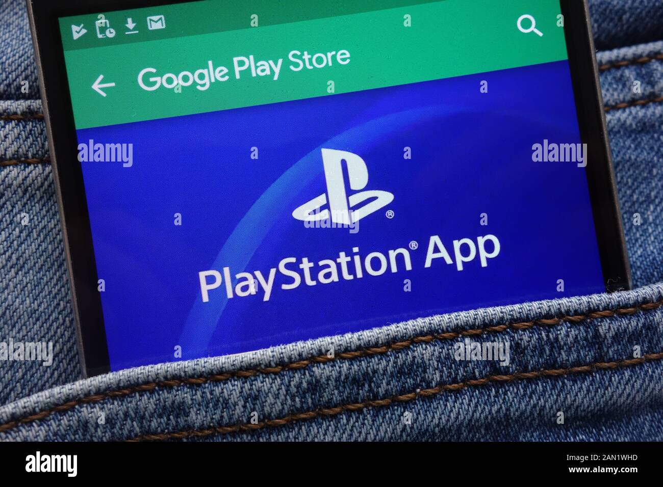 PlayStation app on Google Play Store website displayed on smartphone hidden  in jeans pocket Stock Photo - Alamy