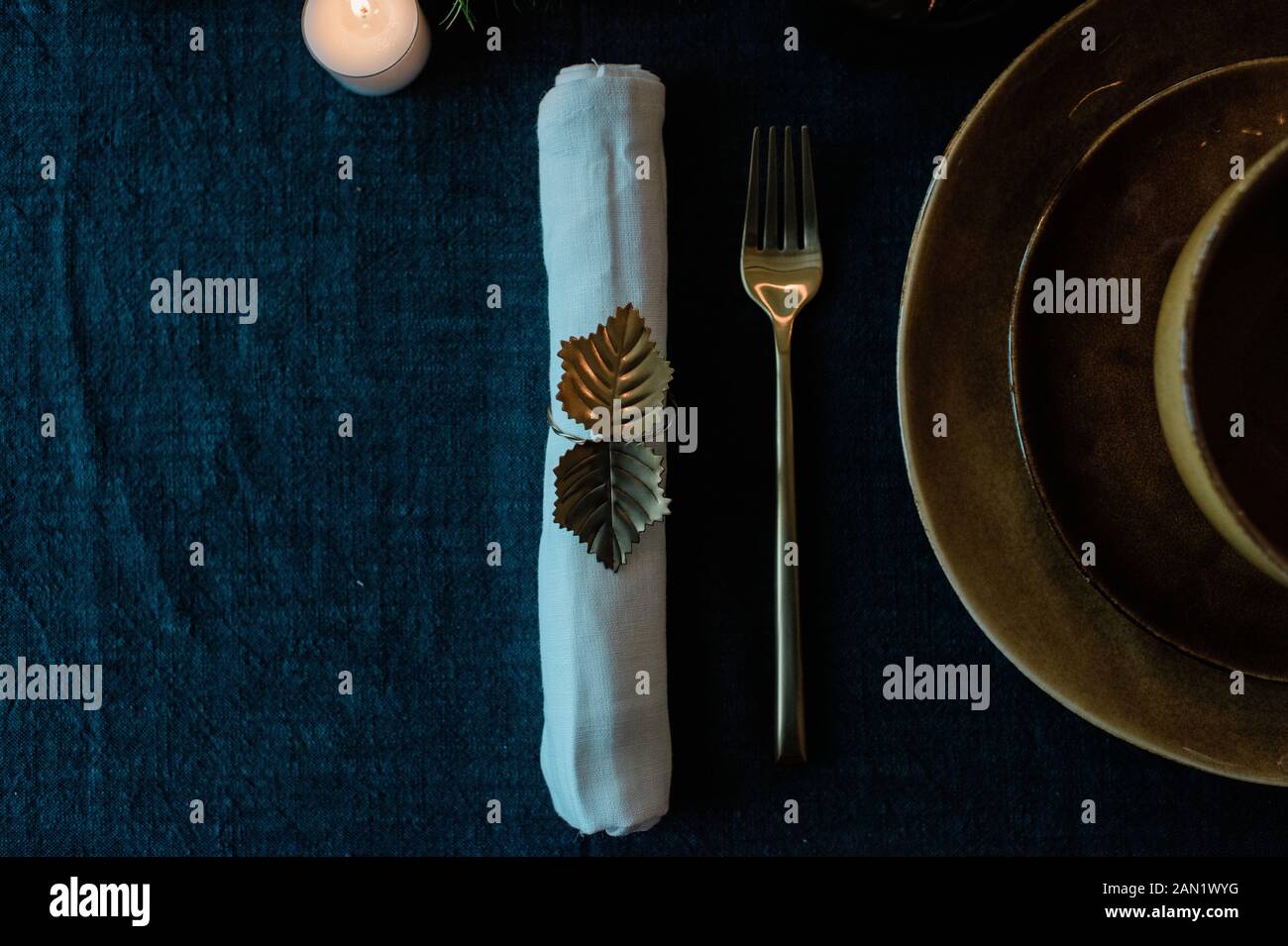 sky view of a gold dinner table setting Stock Photo