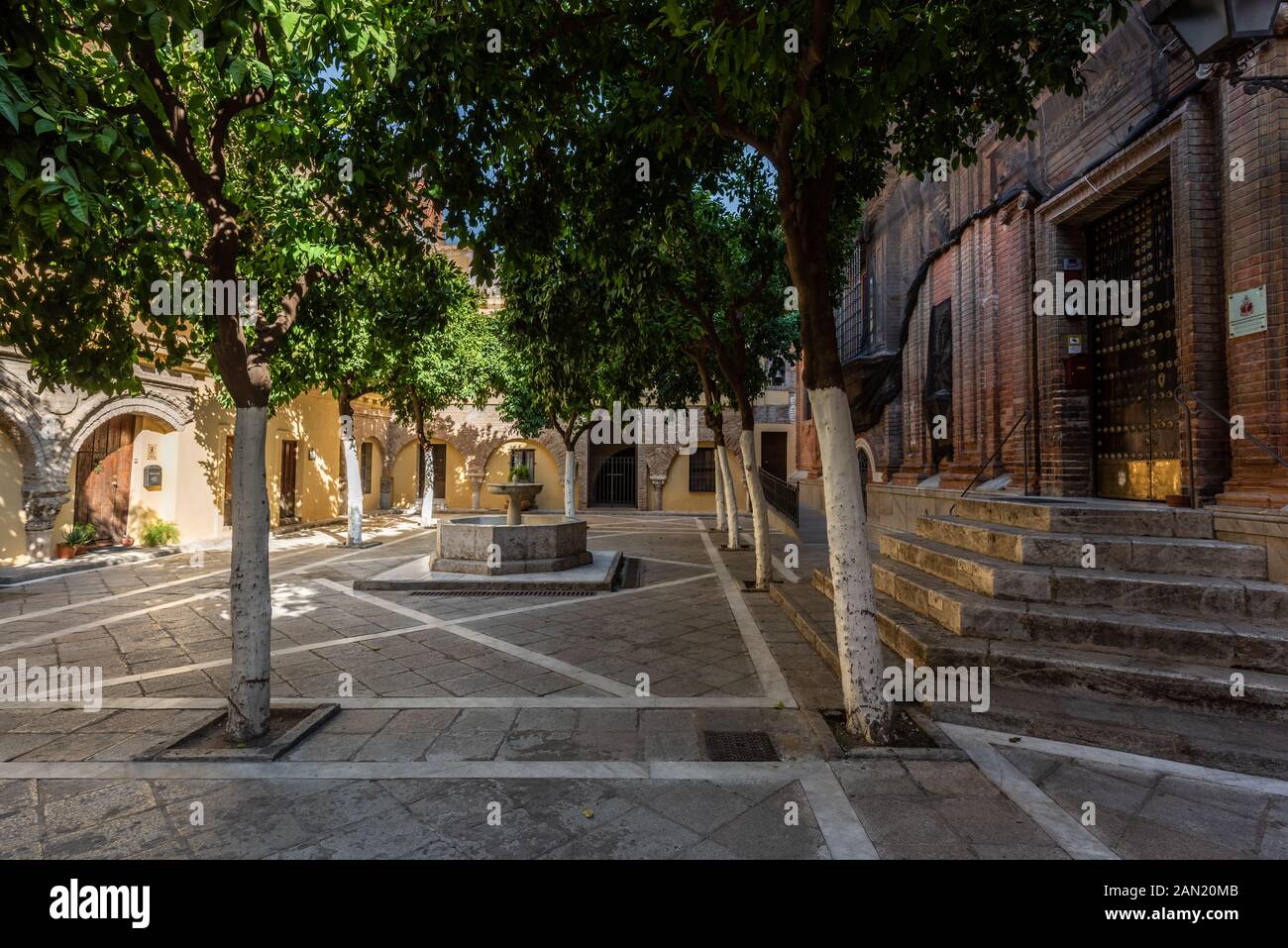 The Patio de Naranjos (orange tree courtyard) in the Iglesia Colegial del Salvador sits on the site of what was once Seville's largest mosque Stock Photo
