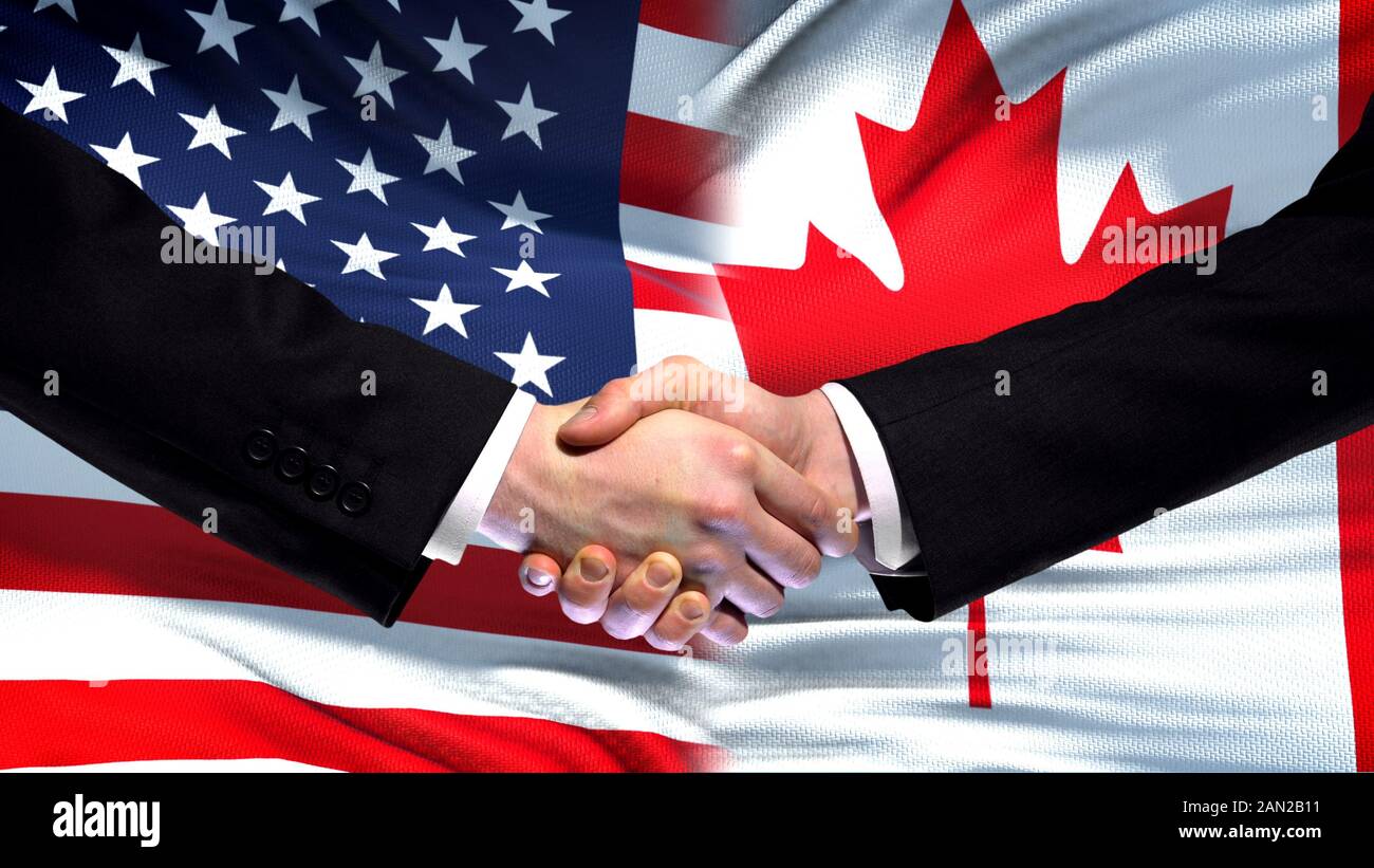 United States and Canada handshake, international friendship, flag