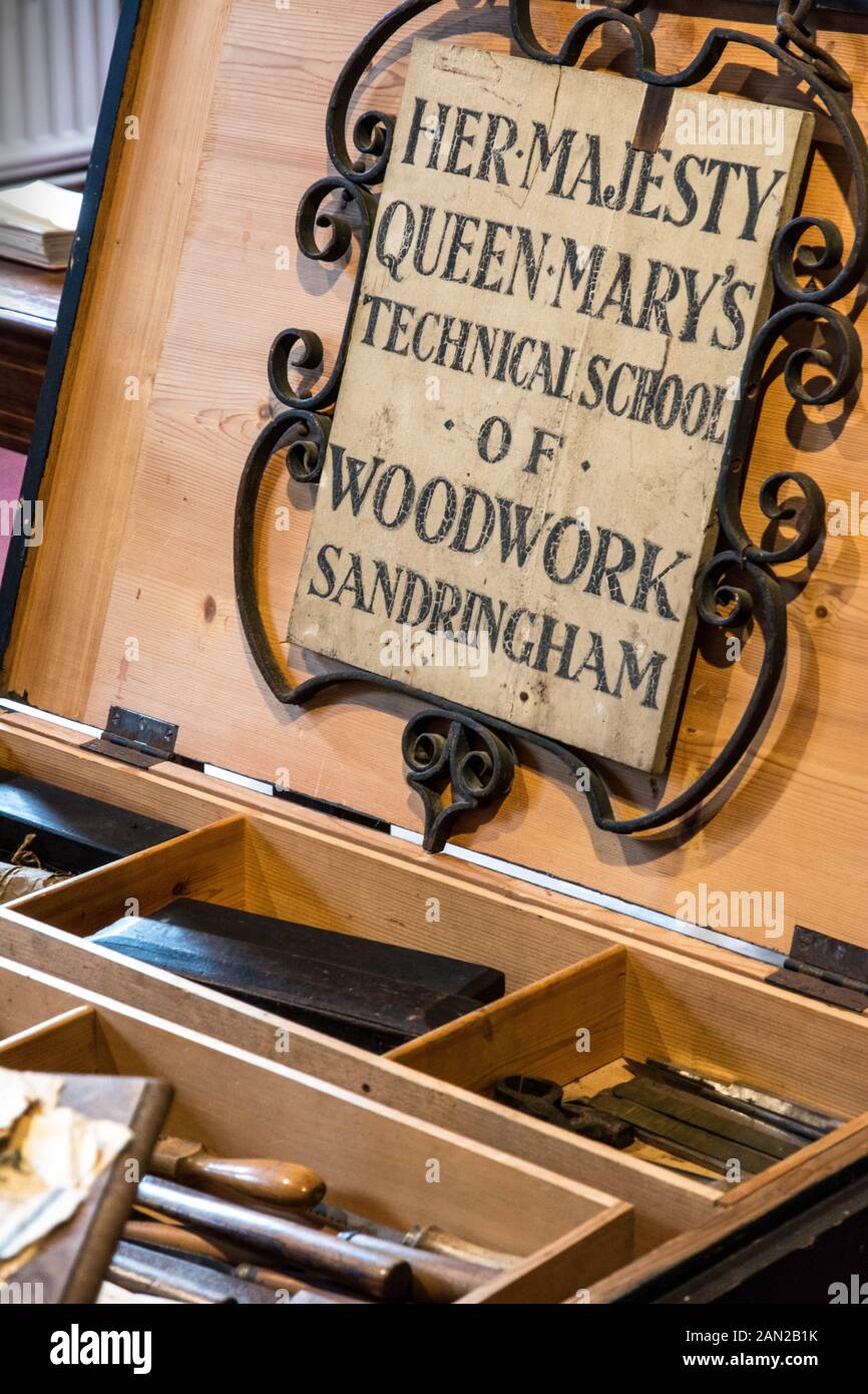 Sign and tools from Her Majesty Queen Mary's Technical School of Woodwork in Sandringham, England, UK Stock Photo