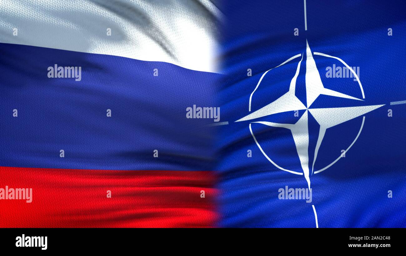 Russia and NATO flags background, diplomatic and economic relations, security Stock Photo