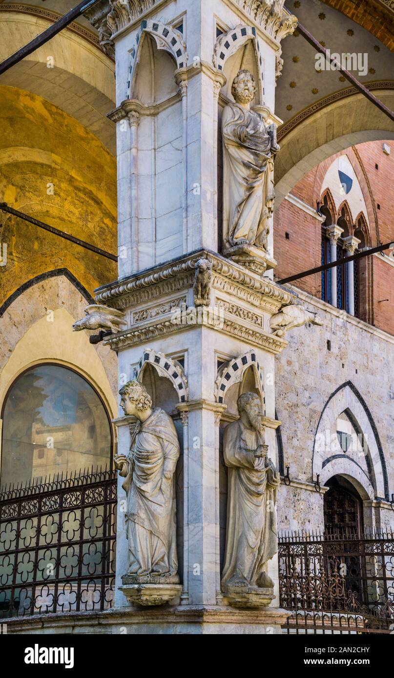 Cappella di Piazza marble loggia at the base of Torre del Mangia of the Palazzo Pubblico town hall in Siena, Tuscany, Italy Stock Photo