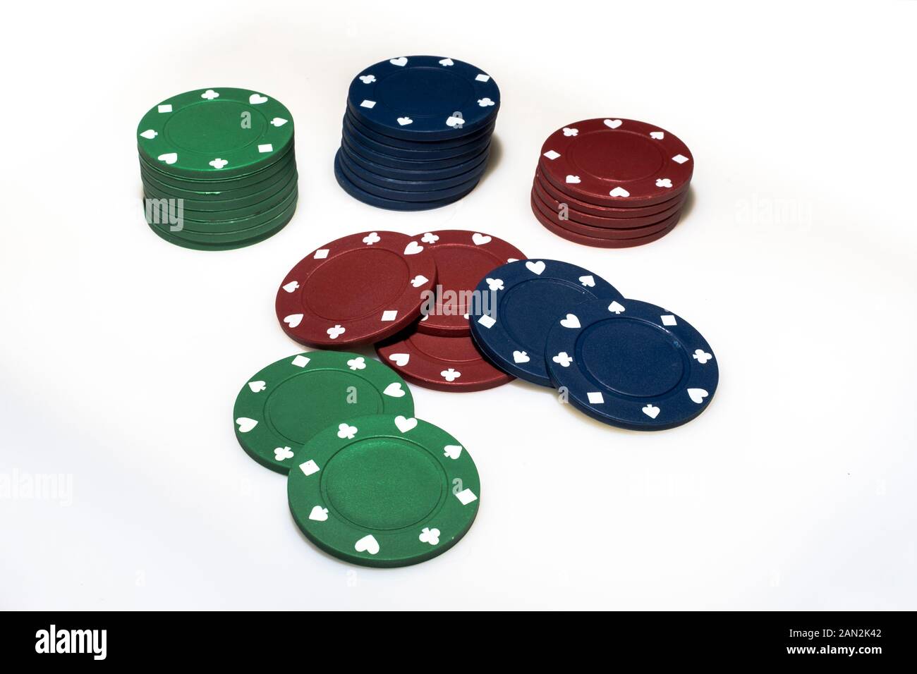 Poker chips on white background. Fichas de poker sobre fondo blanco. Stock Photo