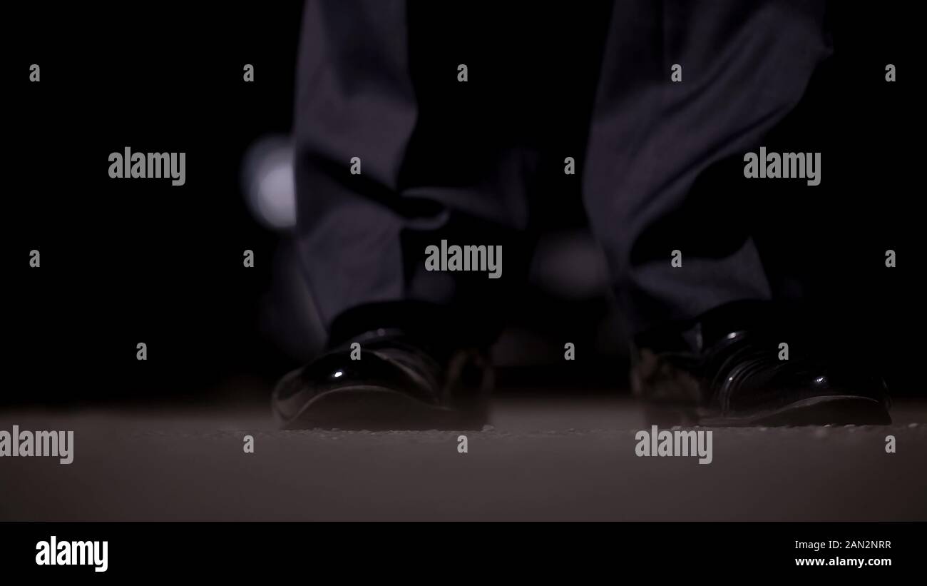 Legs of man in official clothes, illegal business deal at night, drugs trading Stock Photo Alamy