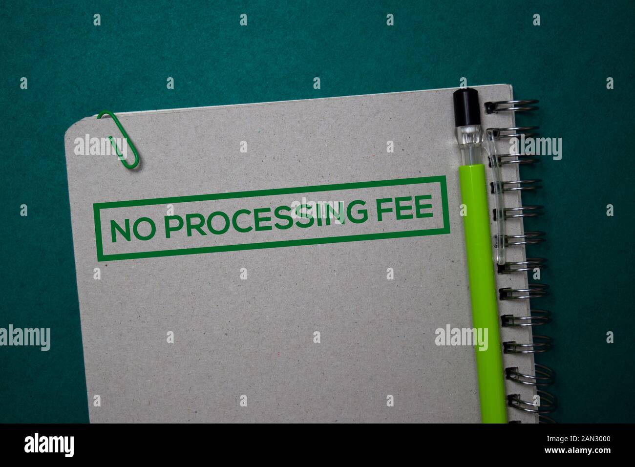 No Processing Fee write on a book isolated on green background. Stock Photo