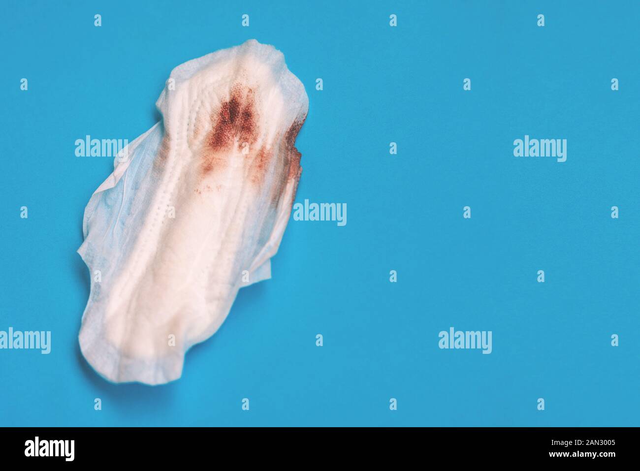 Used sanitary pad with natural blood. Woman on critical days