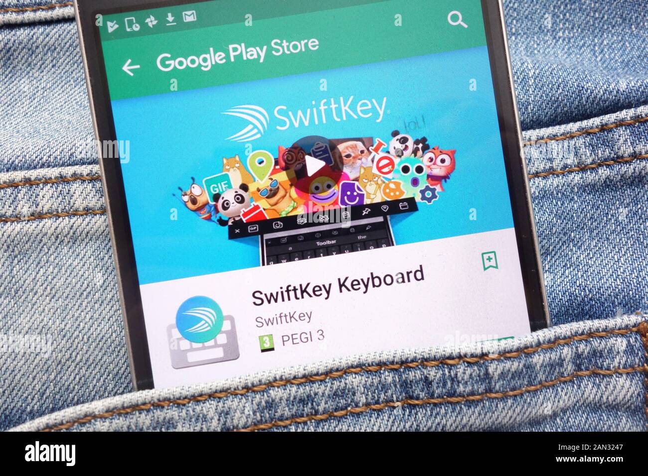 SwiftKey Keyboard app on Google Play Store website displayed on smartphone  hidden in jeans pocket Stock Photo - Alamy