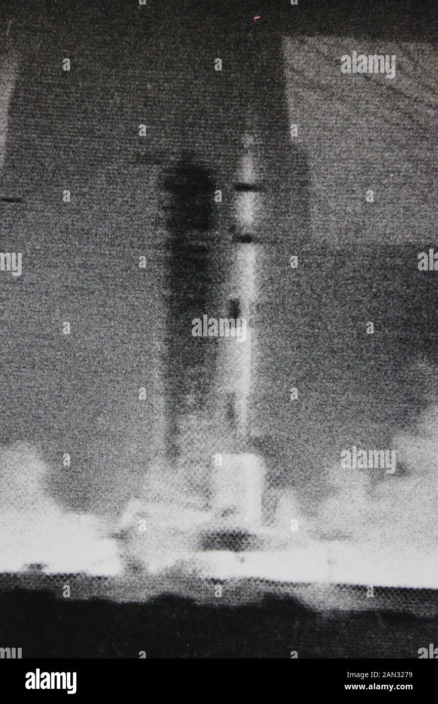 Fine vintage seventies black and white photography of the first Apollo mission of the Saturn V rocket launch on live tv footage Stock Photo