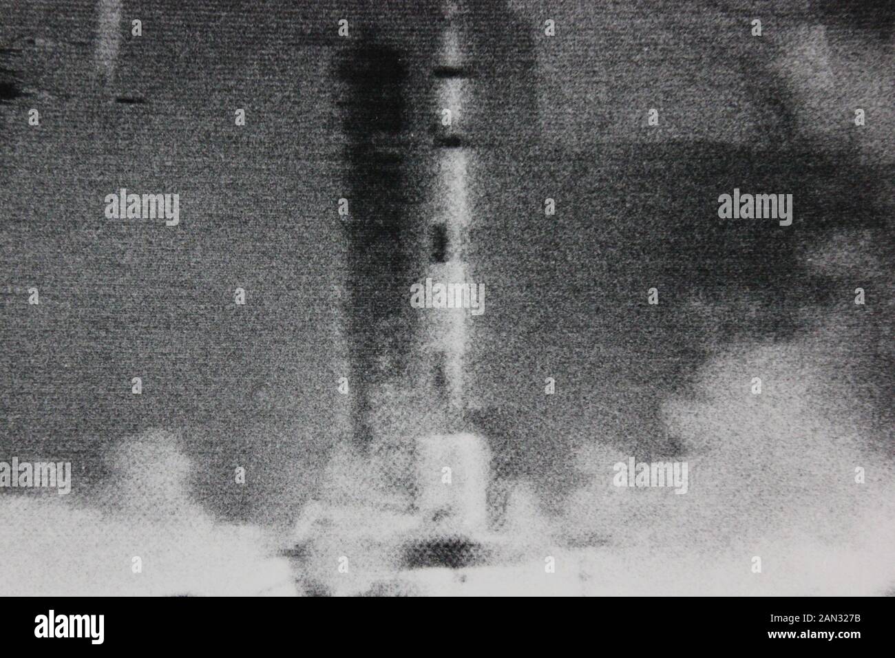 Fine vintage seventies black and white photography of the first Apollo mission of the Saturn V rocket launch on live tv footage Stock Photo