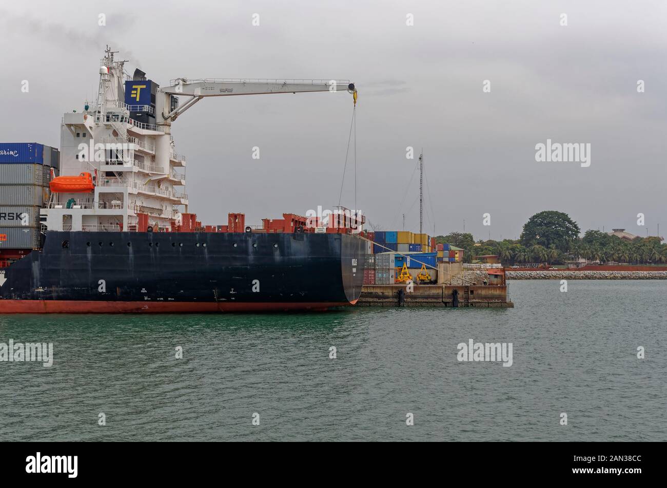 the Stern of a Container Ship berthed at the port of Conakry in Guinea