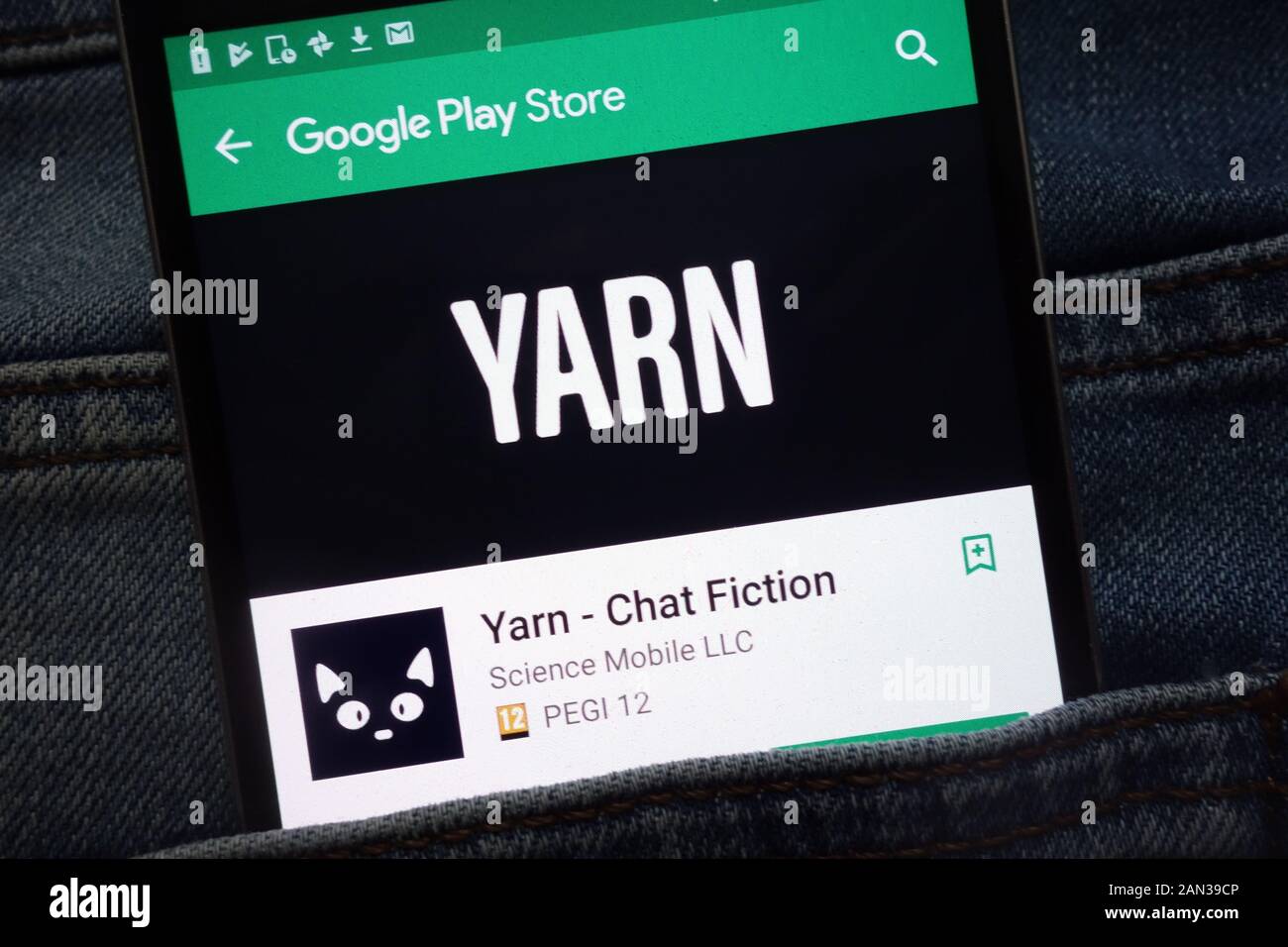 Yarn Chat Fiction app on Google Play Store website displayed on smartphone hidden in jeans