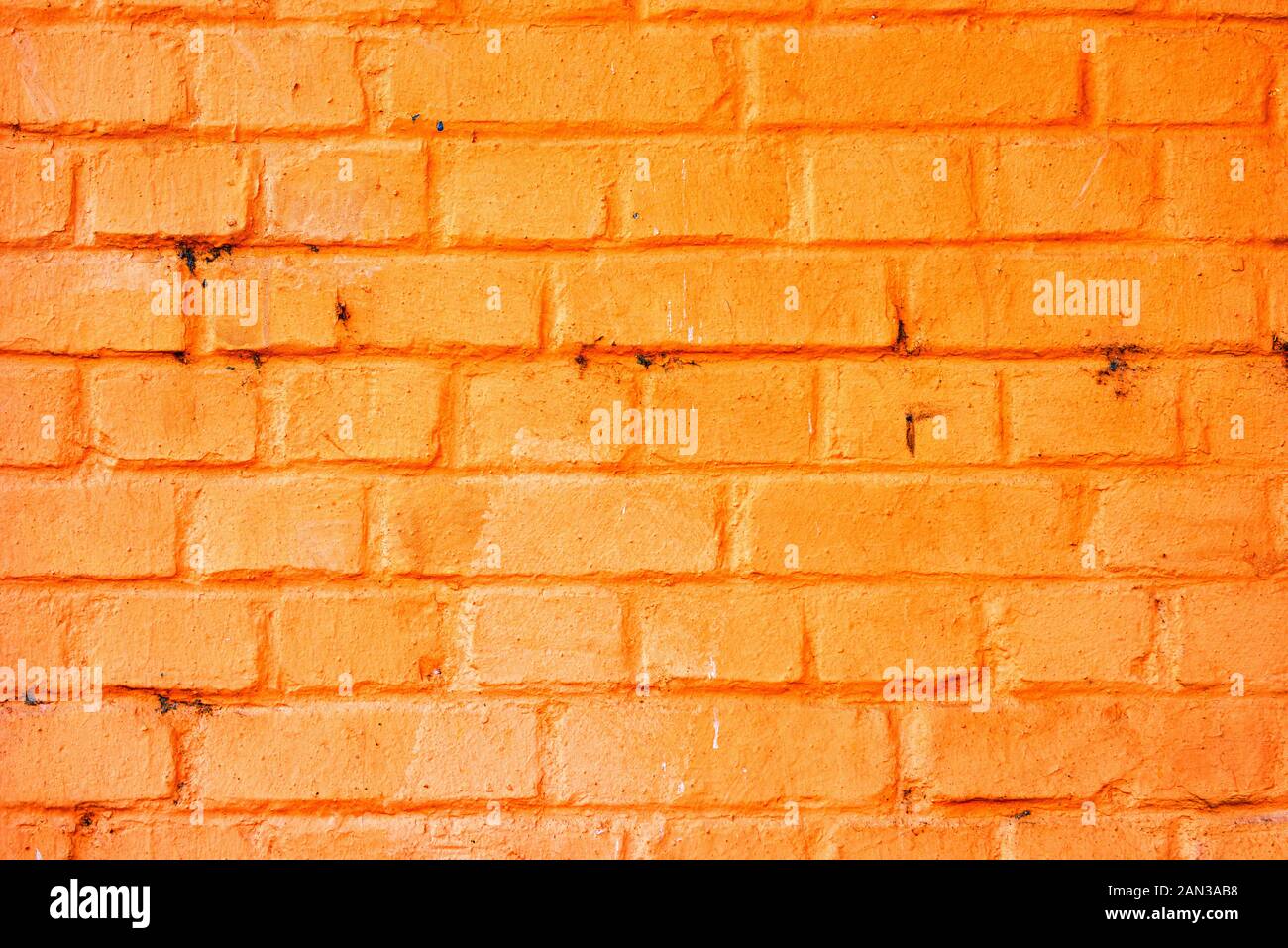 Weathered orange brick wall texture as background Stock Photo - Alamy
