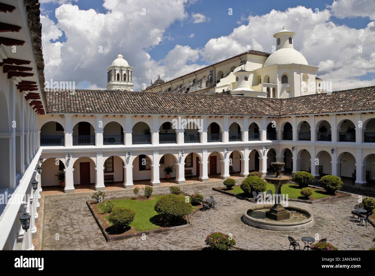 Hotel Dann Monasterio courtyard and Iglesia San Francisco, 'White City' of Popayan, Colombia Stock Photo