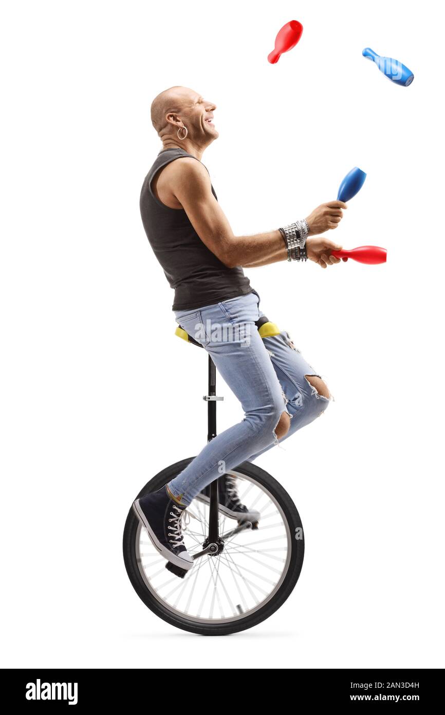 Juggling on a unicycle hires stock photography and images Alamy